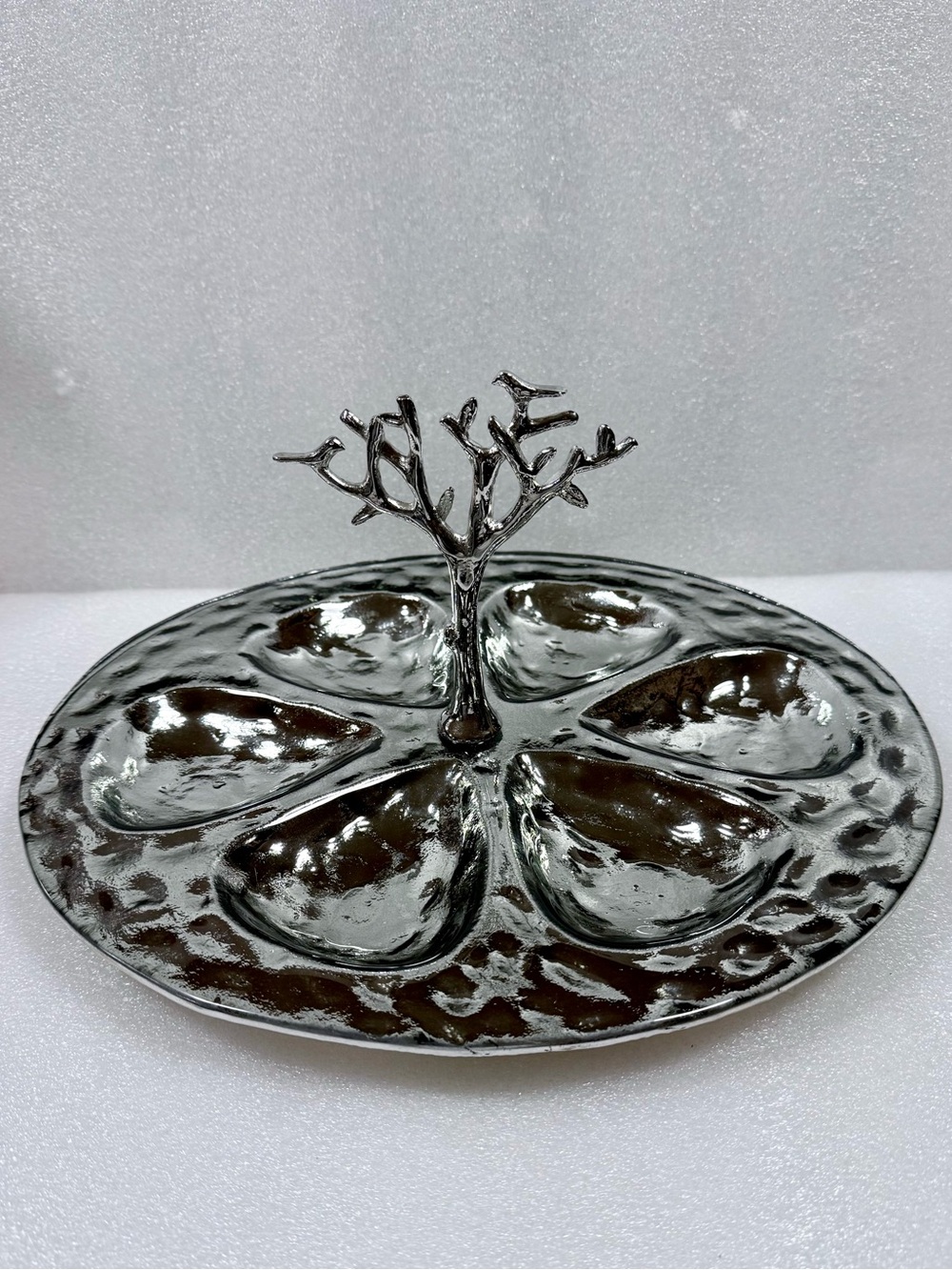 Michael Aram Tree of Life Seder Plate, featuring a hammered metal finish